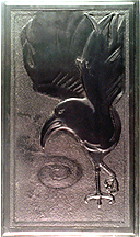 image of a raven with his wings up dancing around a spiral
